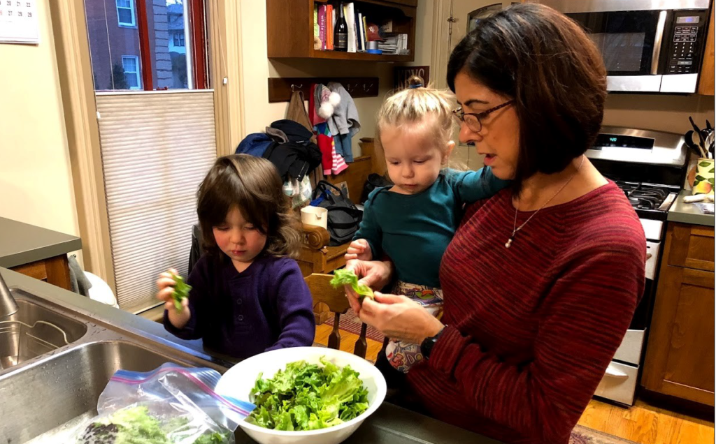 A Message from Bill March 2020 featured image. Bill Anderson's (owner of Oswald's Pharmacy) family making a salad for national nutrition month.