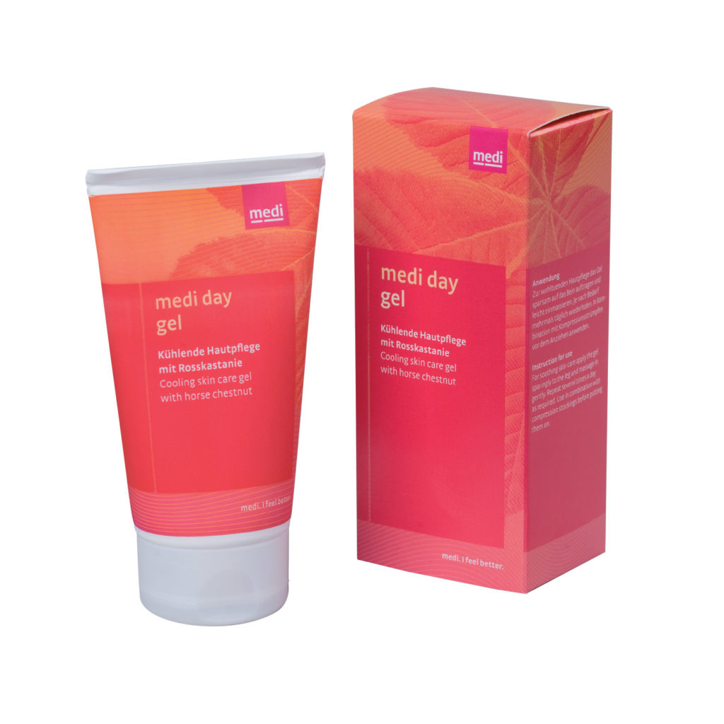 Medi Day Gel. Compression donning aid. Pink and tan tube next to the box it comes in. 50ml size.