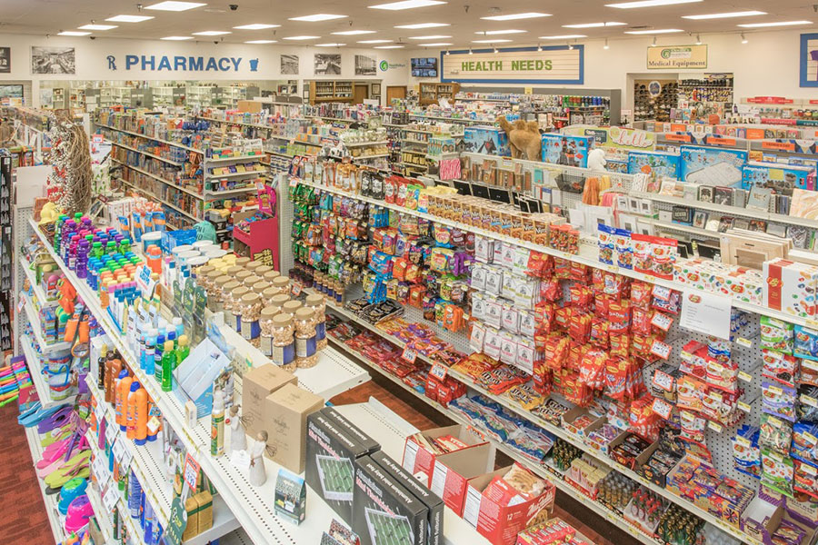 Oswald's Pharmacy inside store. Photo of the interior of Oswald's, showing the pharmacy, gift section, OTC section, candy section, toy section, & USPS post office.