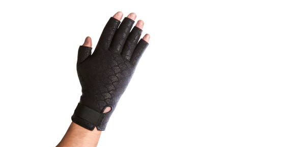 Thermoskin Premium Thermal Compression Arthritis Gloves. A model shows off a textured, black glove. Only the fingertips are visible outside of the glove.