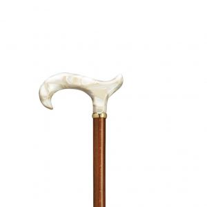 The top half of a Harvy Lucite Handle Bamboo Cane. Ivory colored handle on a cherry wood shaft.
