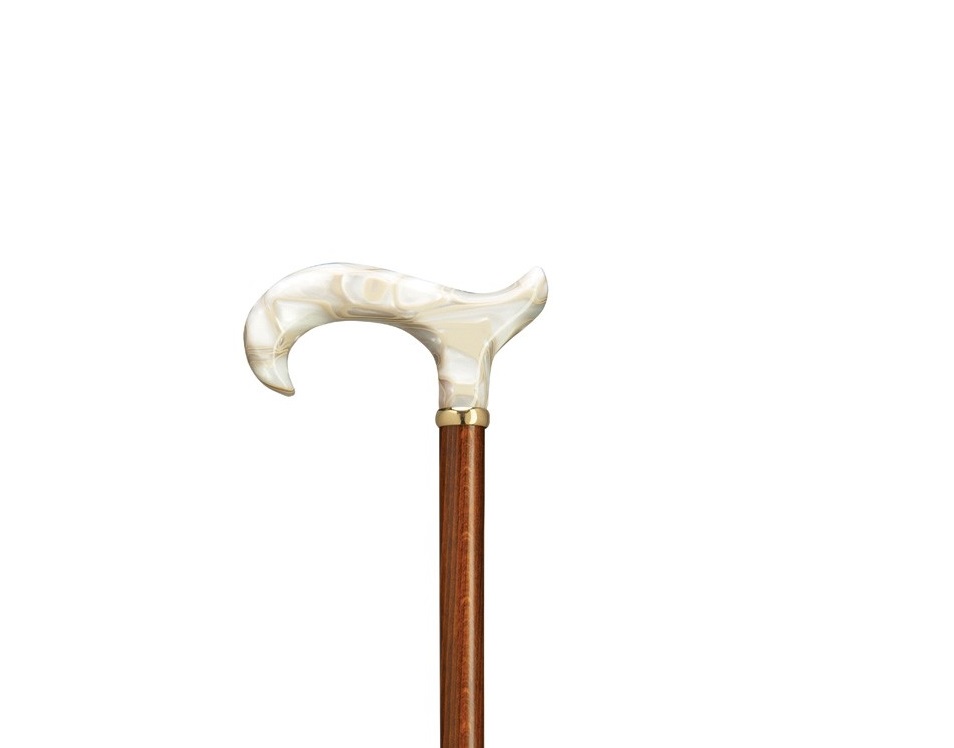 The top half of a Harvy Lucite Handle Bamboo Cane. Ivory colored handle on a cherry wood shaft.