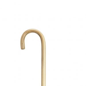 The top half of a Harvy Hospital Cane. Shepherd style curved handle. The entire cane is a very light-tan wood.