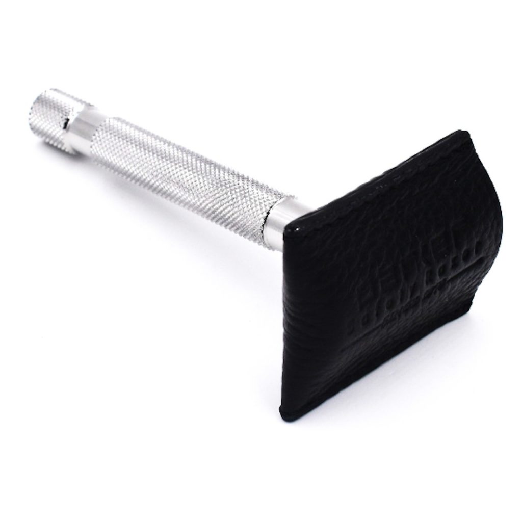 A black leather Parker Safety Razor Cover covering the blade of a silver Parker Safety Razor on white background.