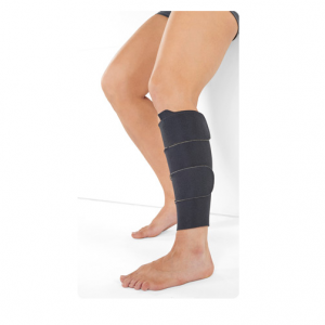 Juzo compression wrap being worn by a male leg model. The wrap is securely wrapped around the man's left calf.