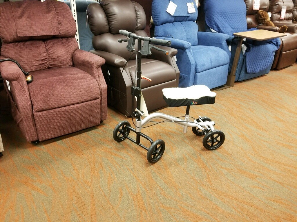 Knee Scooter Blog Featured Image. An image of a Nova TKW-12 knee scooter on the Oswald's Medical Equipment Showroom Floor.