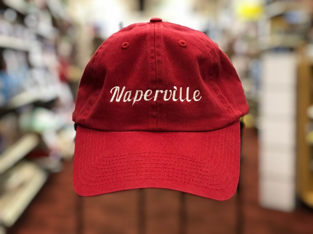 Naperville baseball cap, red with white lettering.