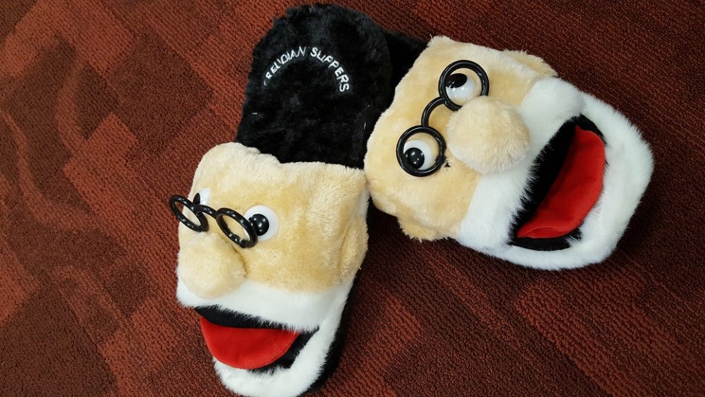 Freudian Slippers made by the Unemployed Philosopher's Guild. Displayed on Oswald's signature red carpet.