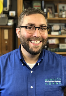 A photo of Alex Anderson, general manager of Oswald's Pharmacy.