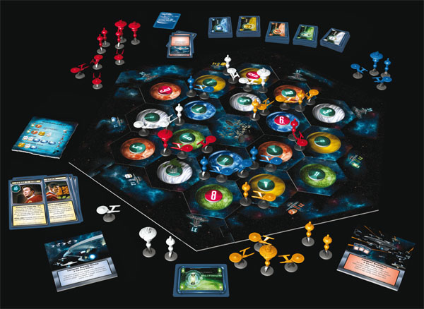 Star Trek Catan board game contents. Board, game pieces, and game cards shown on a black background.