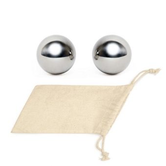 Stainless Steel Whiskey Balls. Image of two stainless steel whiskey balls on top of a small canvas sack.