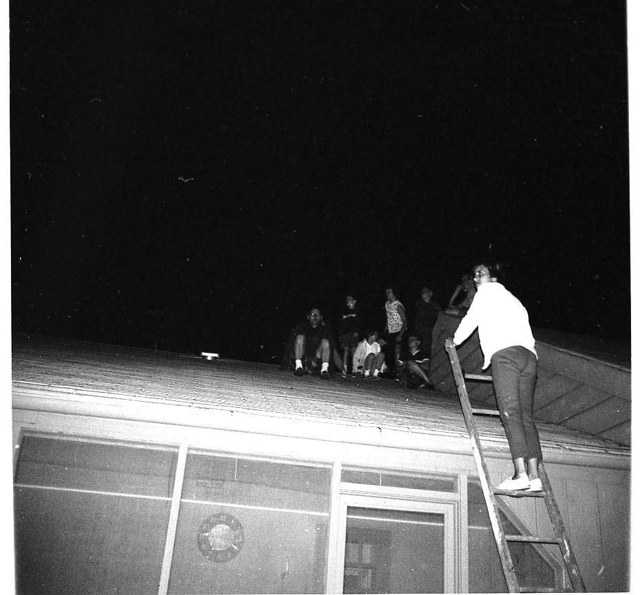 A Message from Bill July 2020 inset image. Picture of the Anderson family watching fireworks on grandpa's roof in Naperville, 1967.