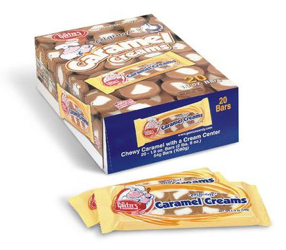 Goetze's Caramel Creams. Photo of a box of Goetze's Caramel Creams, with two individual packages in front.