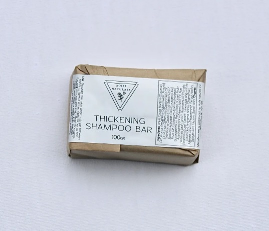 Aoife Naturals Thickening Shampoo Bar. Photo of the bar in packaging.