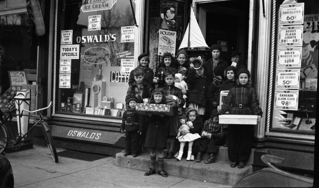Oswald's Doll Contest. Photo of a Doll Contest held by Oswald's in the 1930s.