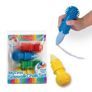 Melissa and Doug My First Sidewalk Chalk Set. Photo of the product packaging next to a child using a blue chalk holder.
