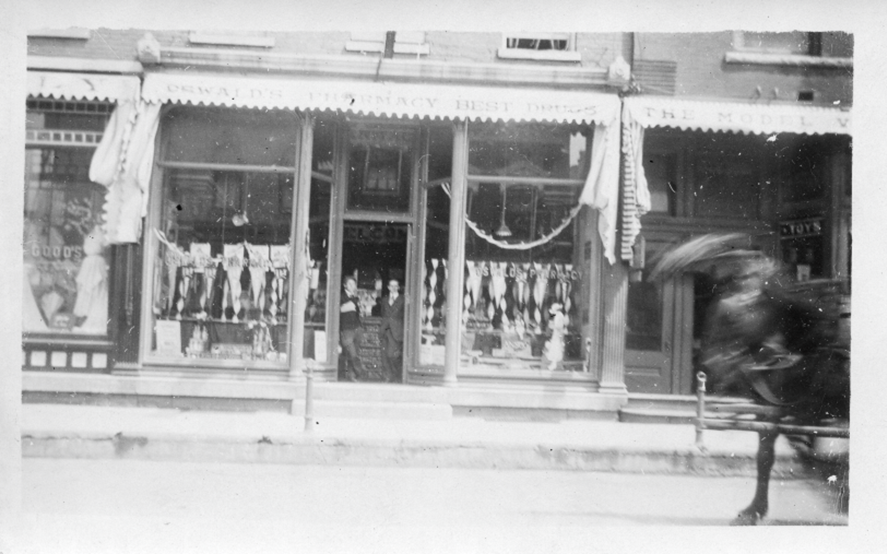 A Message from Alex 9.24. Photo of a horse in front of Oswald's Pharmacy in the early 1900s.