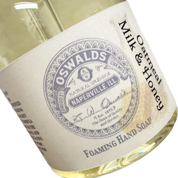 Close-up of Oswald’s Pharmacy Oatmeal Milk & Honey Foaming Hand Soap label with vintage-style apothecary branding.