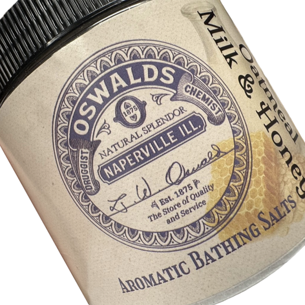 Close-up of Oswald’s Pharmacy Oatmeal Milk & Honey Aromatic Bathing Salts label featuring vintage apothecary-style branding.